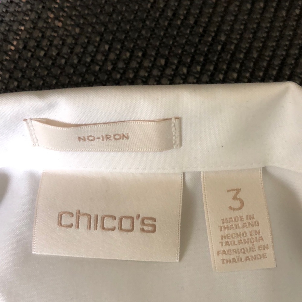 Chicos size 3 no iron white cotton shirt. 3/4 sleeves with button cuffs.